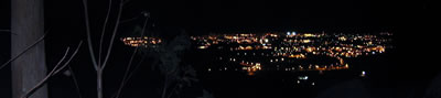 foto nocturna na serra de sintra com vista sobre a zona de cascais